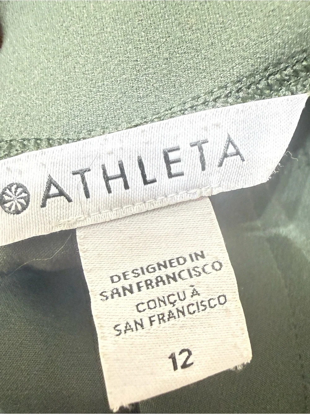 Athleta 12 Endless High Rise Olive Green Ankle Commute Office Travel Athleisure
